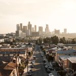 cars parked on roadside in front of houses at daytime Los Angeles