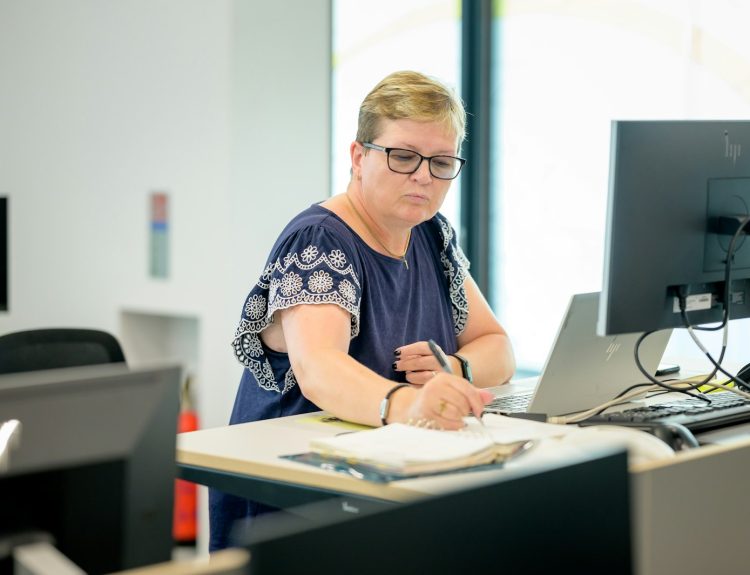 a person sitting at a desk